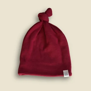 Bonnet à noeud évolutif en laine de mérinos - rubis